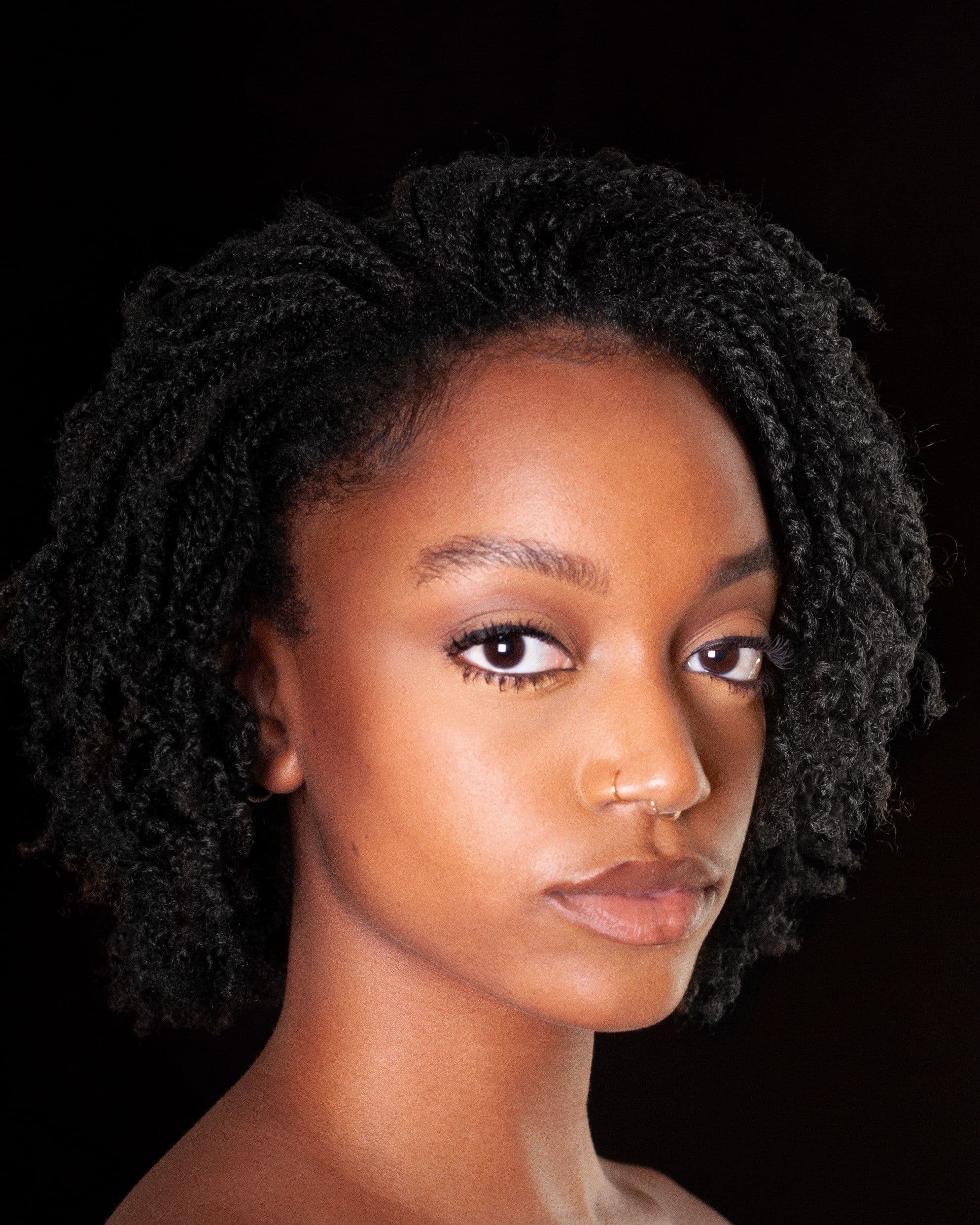 Headshot of Keturah Stephen against a black background
